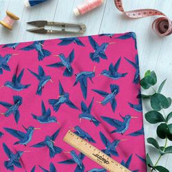 Ткань оксфорд 210 синие калибри на розовом фоне