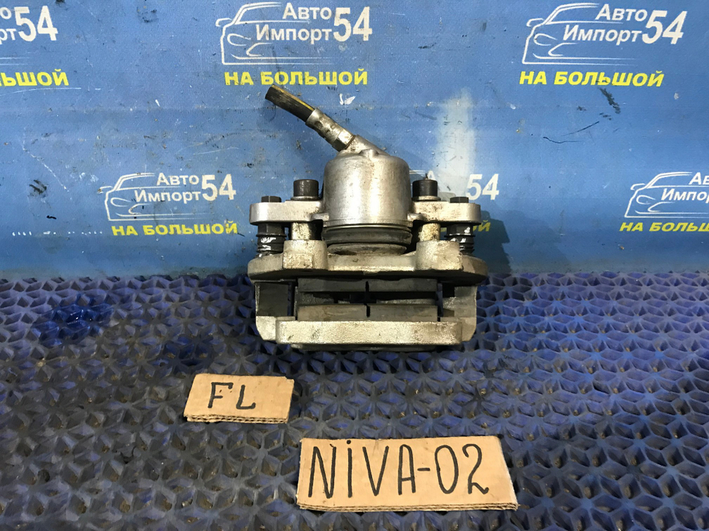 Суппорт тормозной передний левый CHEVROLET NIVA 2006