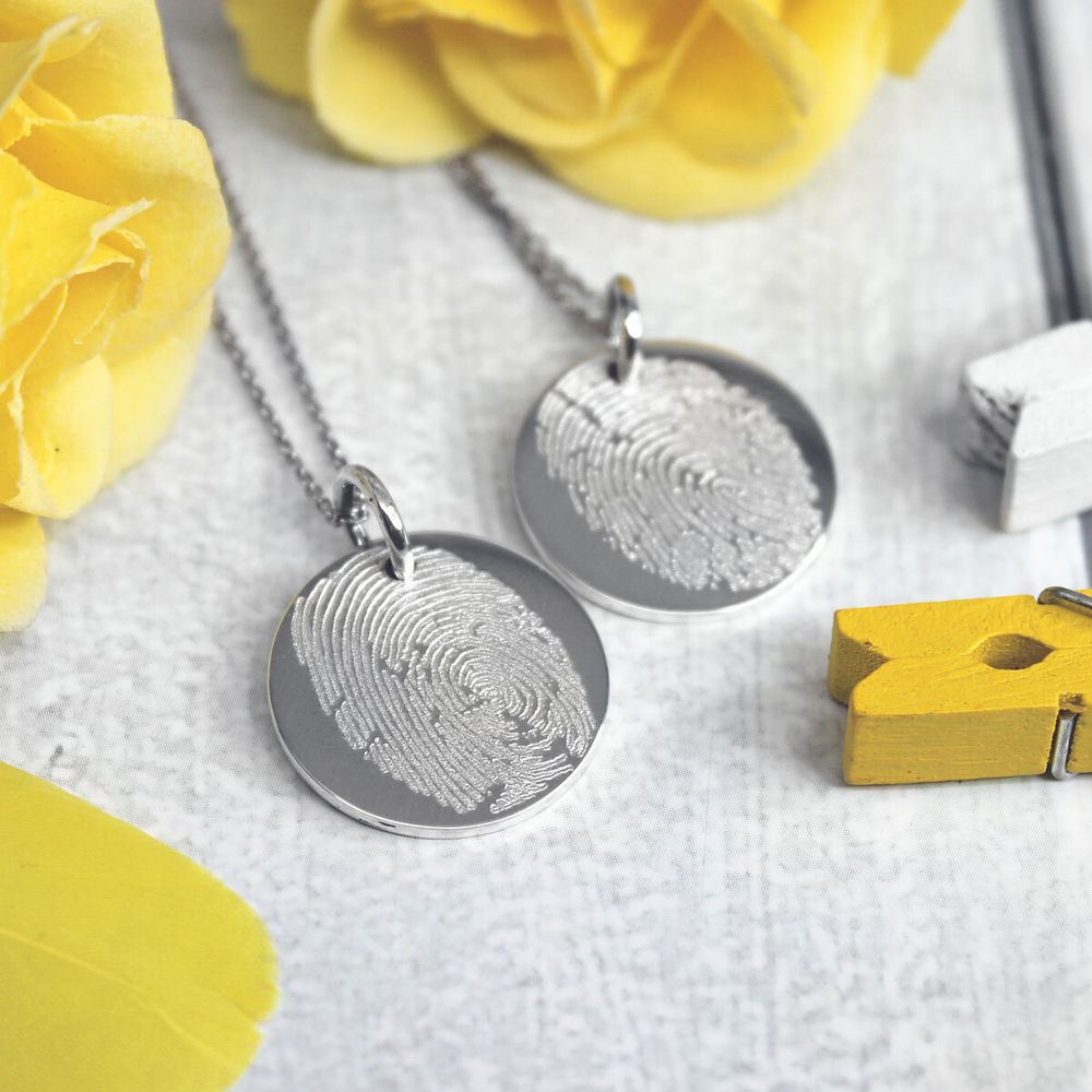 Парные кулоны из серебра с отпечатками пальцев на заказ