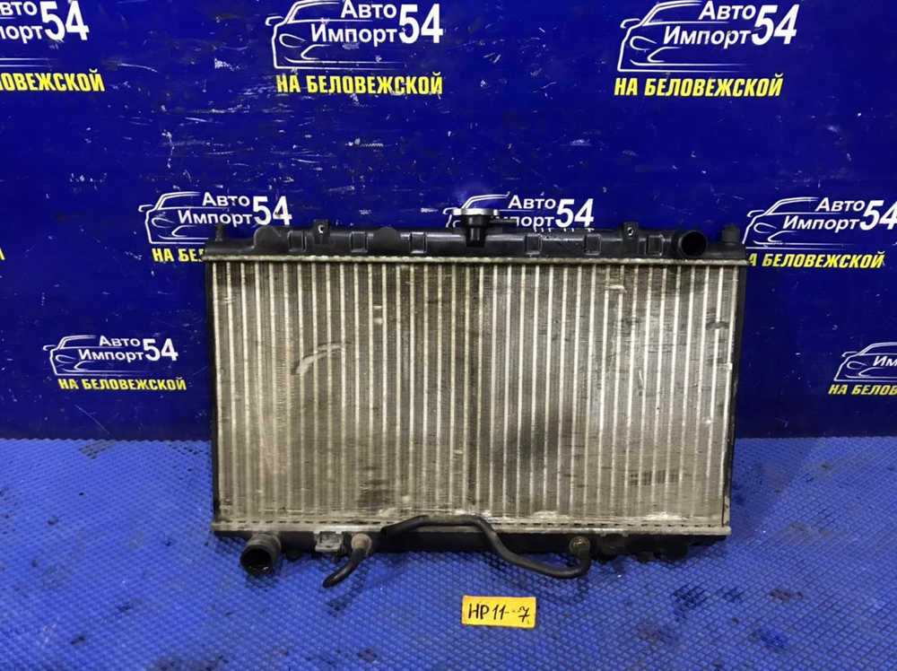 Радиатор двигателя NISSAN PRIMERA 1998
