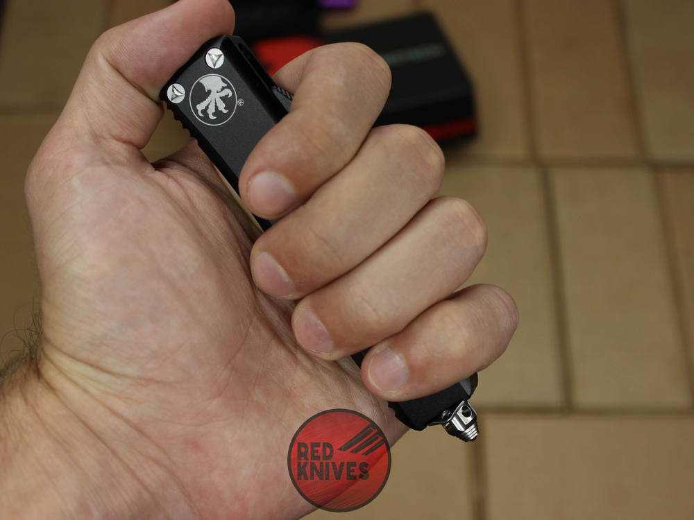 Нож Microtech UTX-85 T/E - черная рукоять, танто клинок, сатин + запчасти RK-390