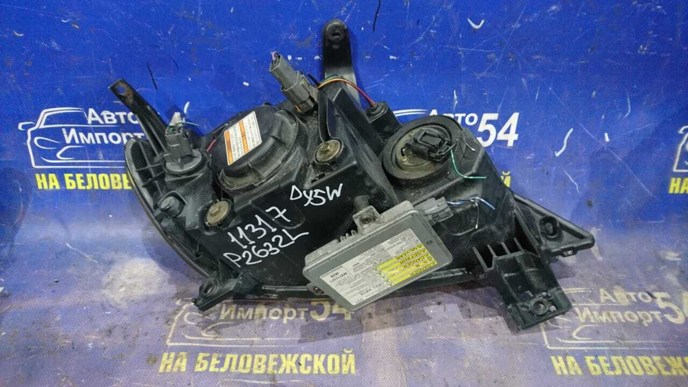 Фара передняя левая MAZDA DEMIO 2002-2005