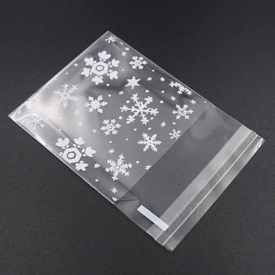 100 пакетиков 7х7+3 см. с клеевым клапаном и рисунком Снежинки