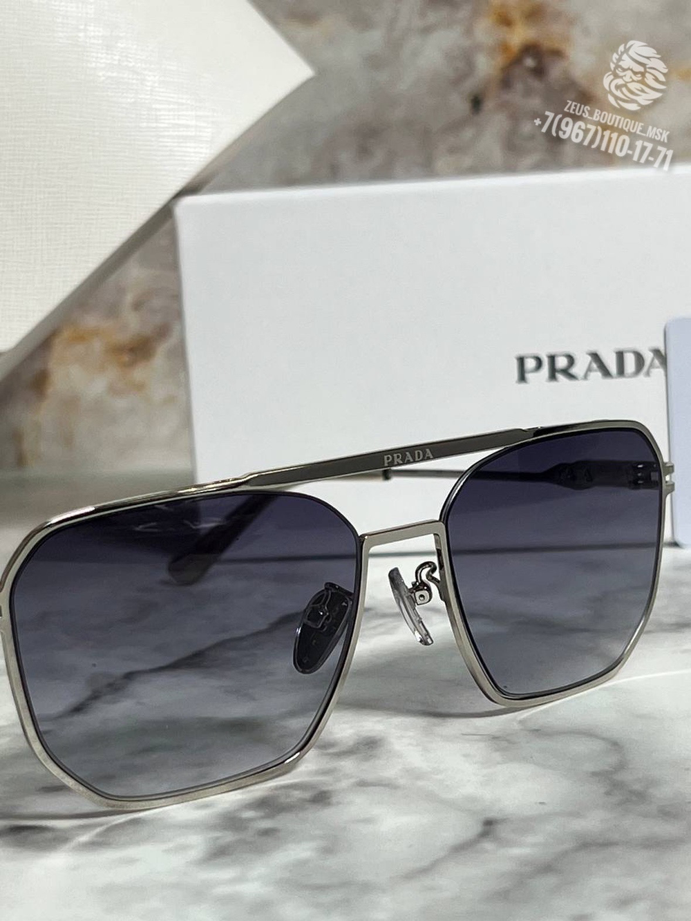 Солнечные очки Prada
