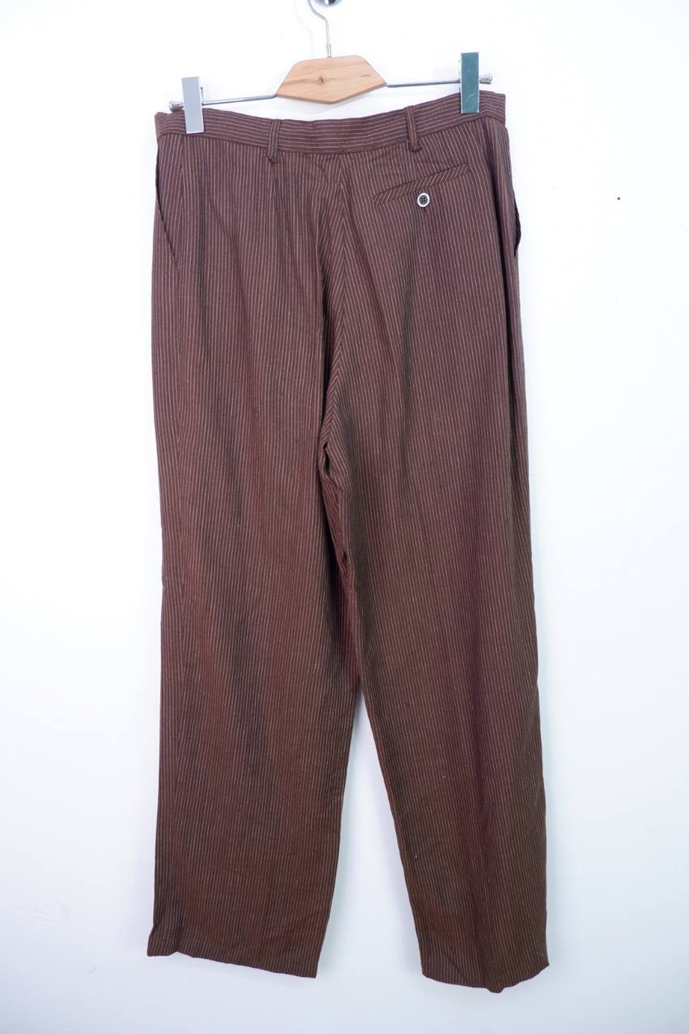 Брюки в мелкую полоску, визуально на 48/50 размер