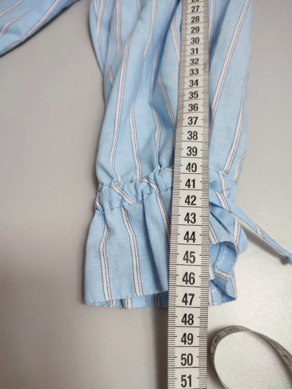 Блузка голубая в полоску 46 размер