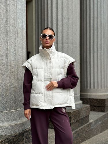 Молочный утепленный жилет