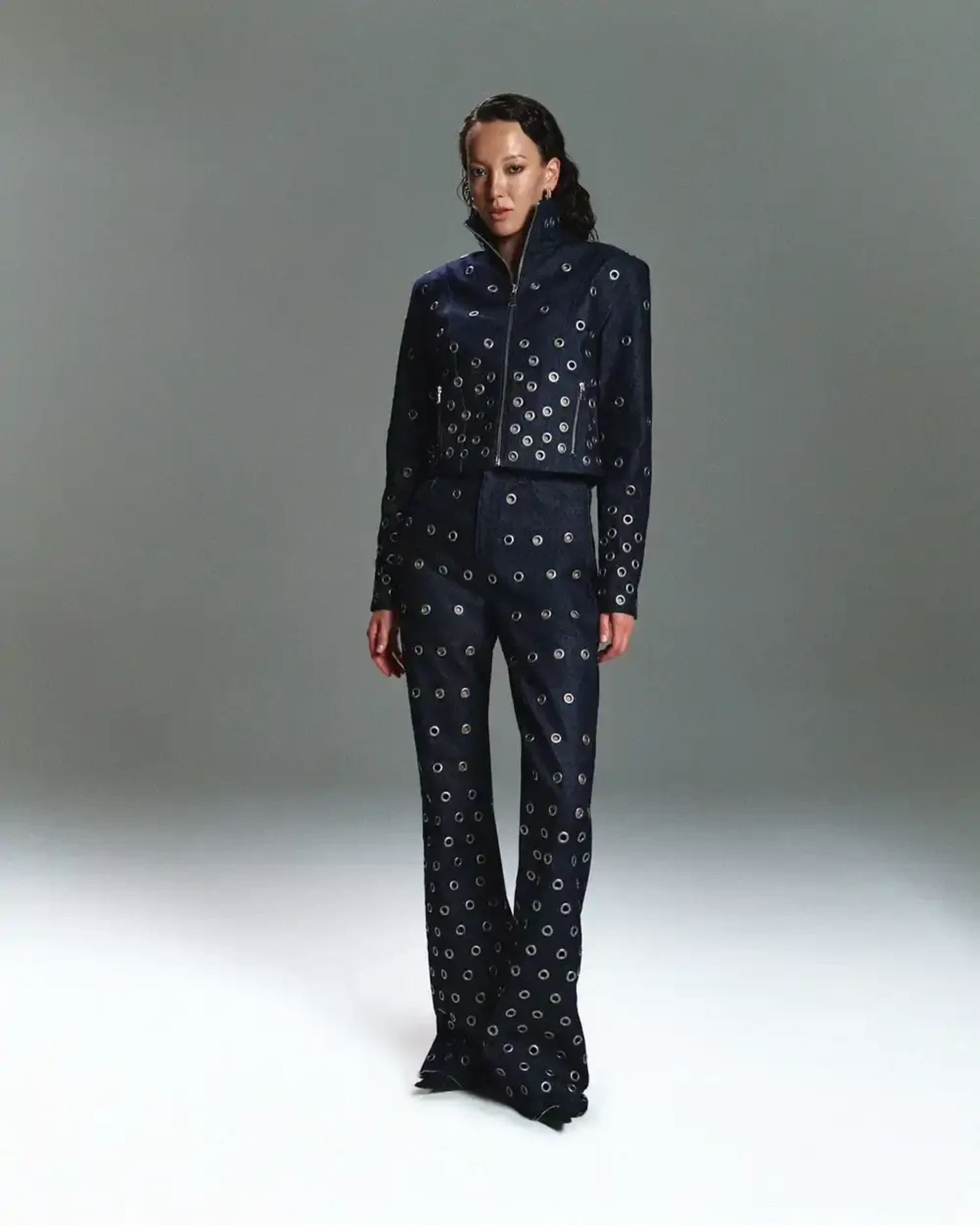 Джинсы Raw с люверсами