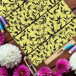 Ткань габардин чёрный бамбук на жёлтом фоне