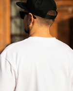 Футболка белая с лого на груди M