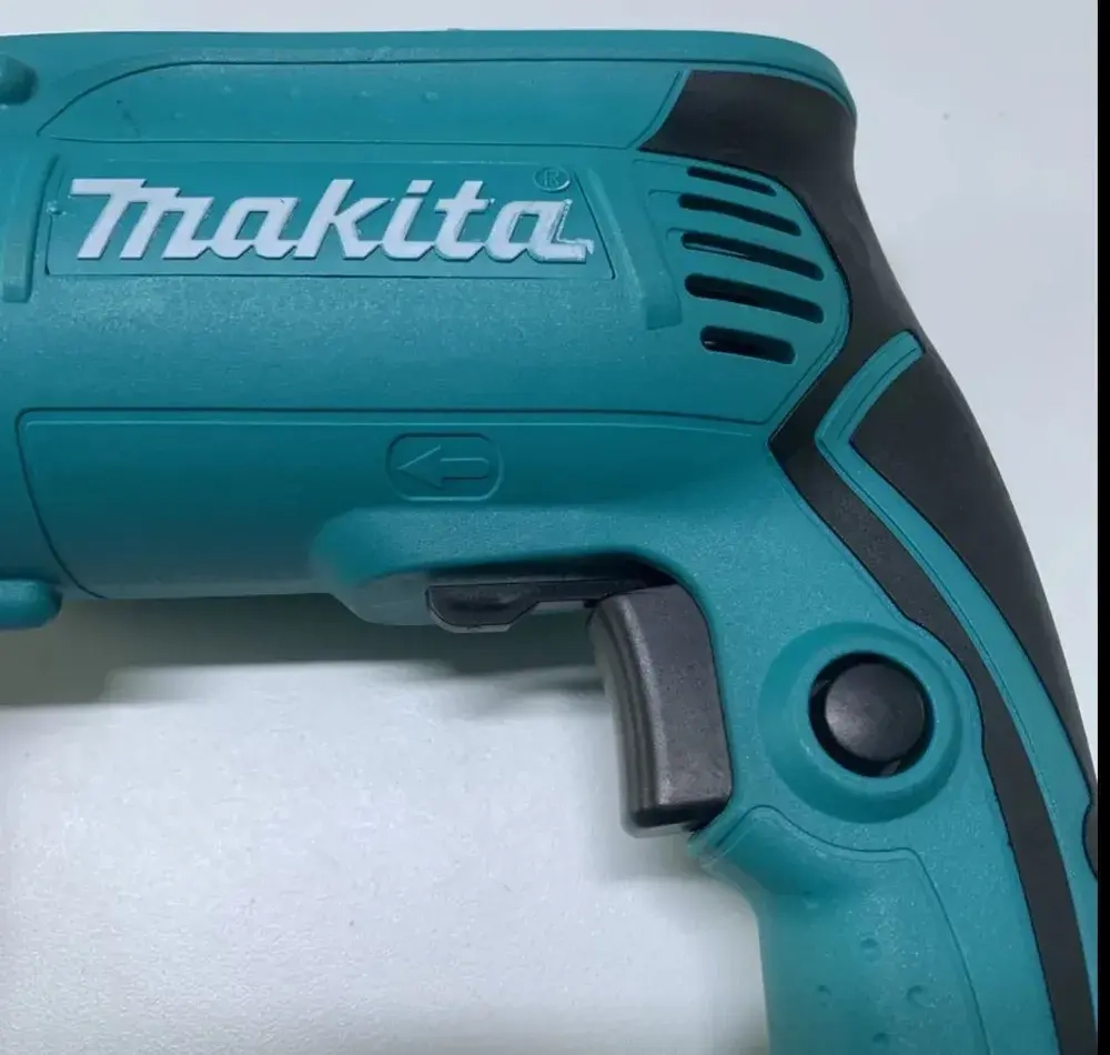 Ударная дрель Maкита HP 1630