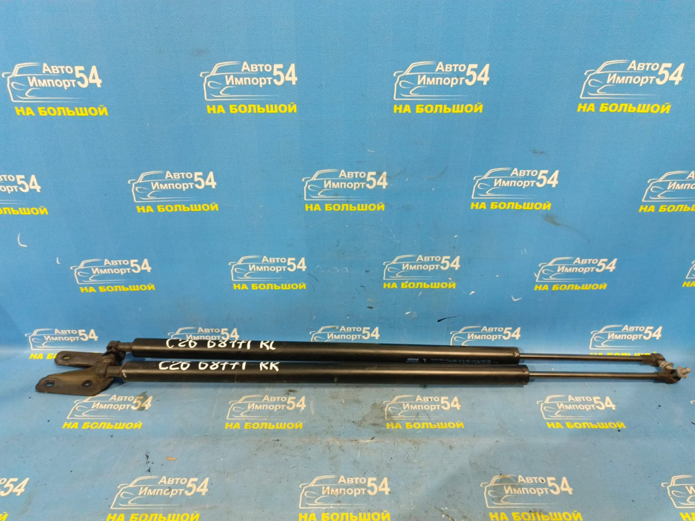 Амортизатор задней двери левый NISSAN SERENA 2010-2016