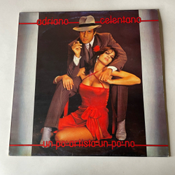 Винтажная виниловая пластинка LP Adriano Celentano, Un Po Artista Un Po No (Италия 1980) Il Tempo Se Ne Va