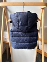 Пуховой жилет Gucci, 86