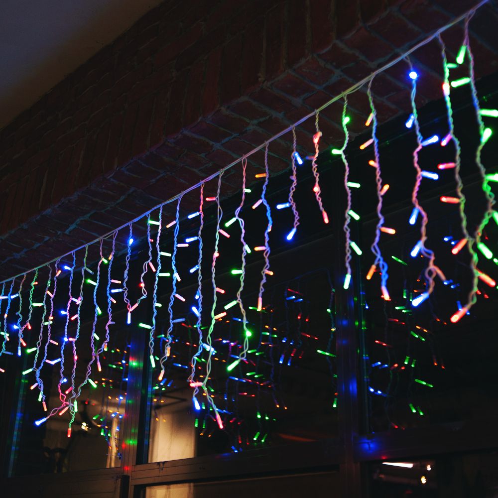 ULD-B3010-200-TWK MULTI IP67 Бахрома светодиодная с эффектом мерцания. 3м. Соединяемая. 200 светодиодов. Разноцветный свет. Провод белый. TM Uniel.