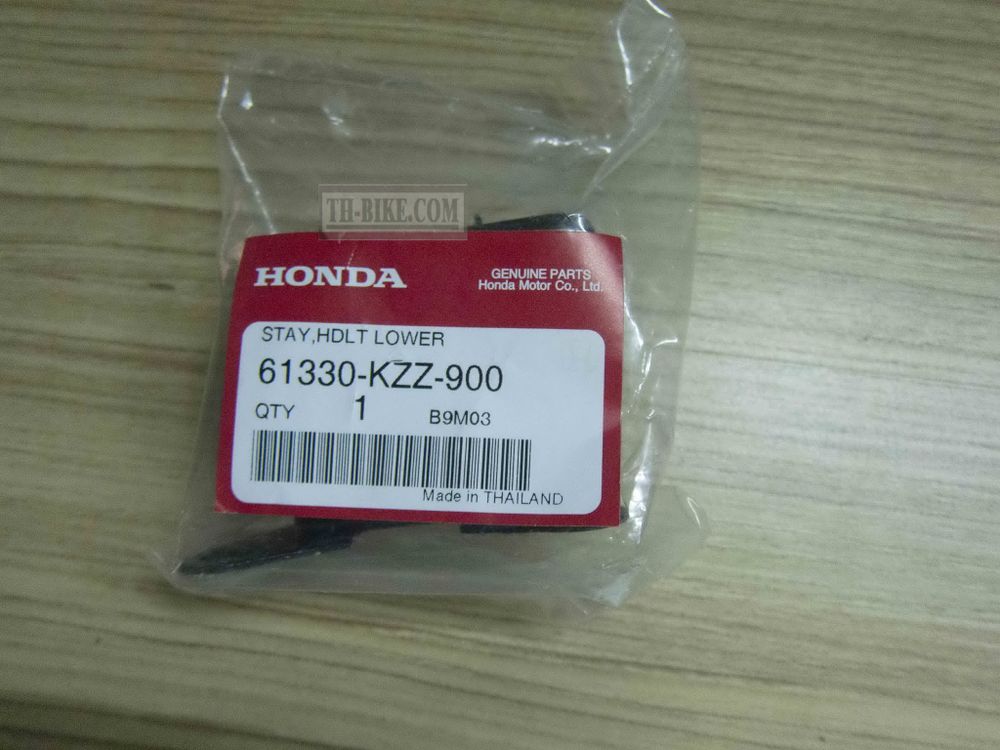 61330-KZZ-900. STAY, HEADLIGHT LOWER. Honda CRF250L-M (2012-2020)