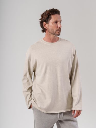 Бежевый лонгслив с необработанным краем