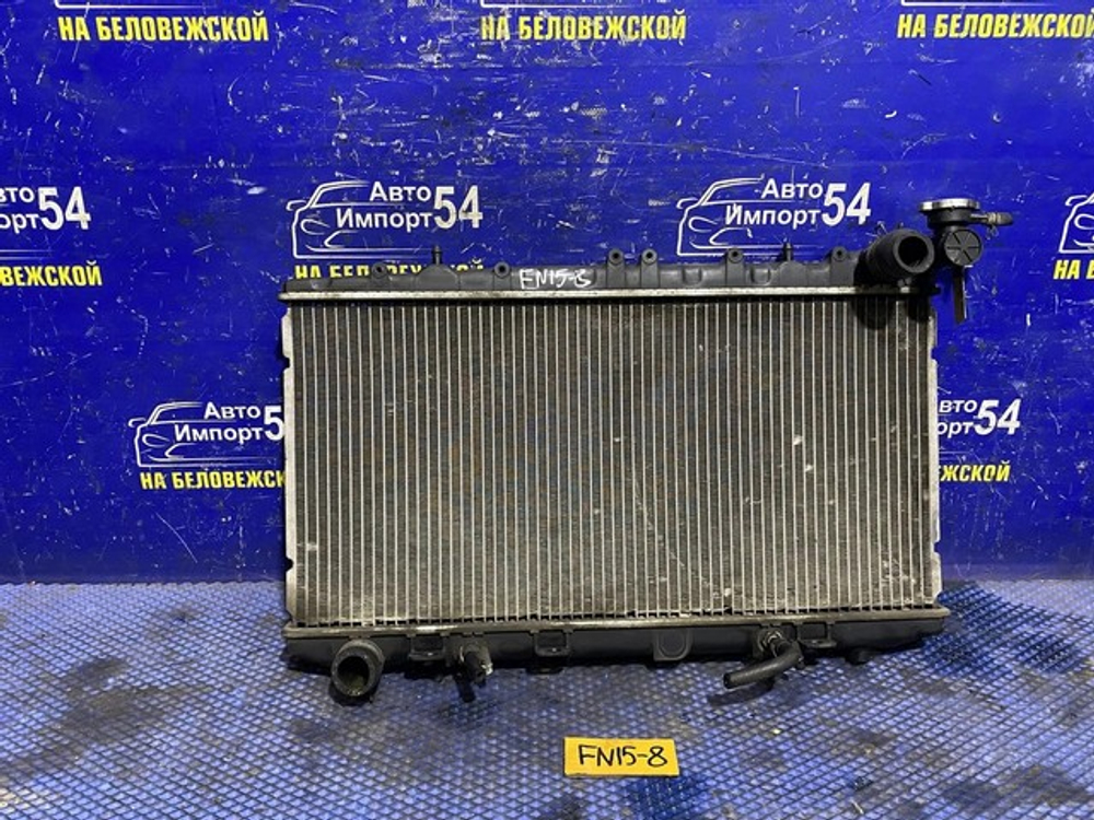 Радиатор двигателя NISSAN PULSAR 1998