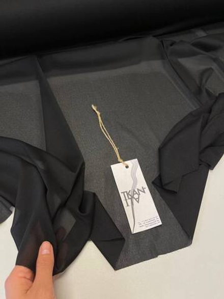 Дублерин эластичный клеевой (плотность 25гр/м2) (100%PE, Черный, 150, 130-150 градусов)