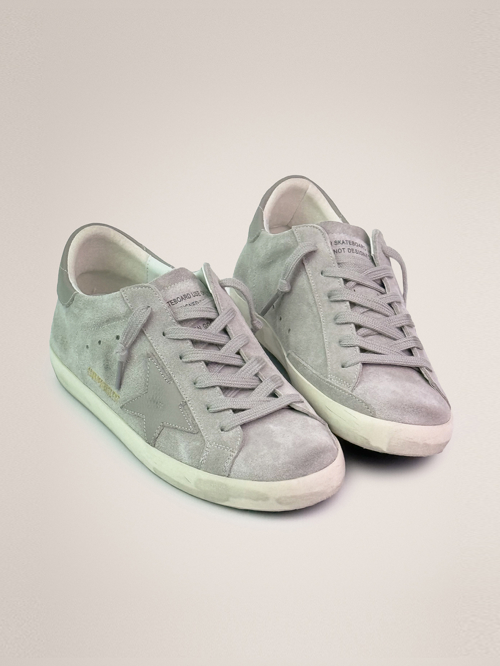 Super Star in grey suede with lizard print inserts
