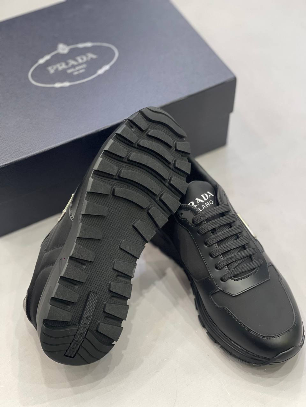 Кроссовки Prada