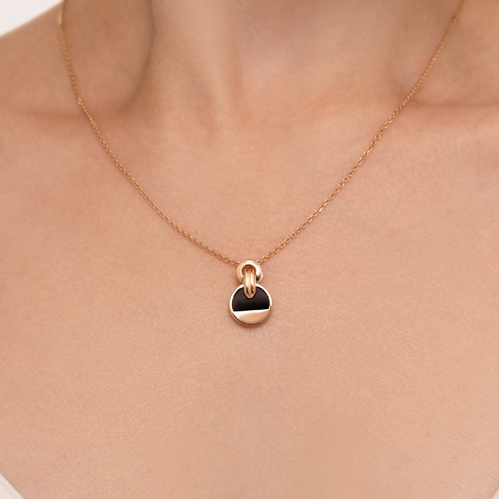 Подвеска из красного золота с ониксом