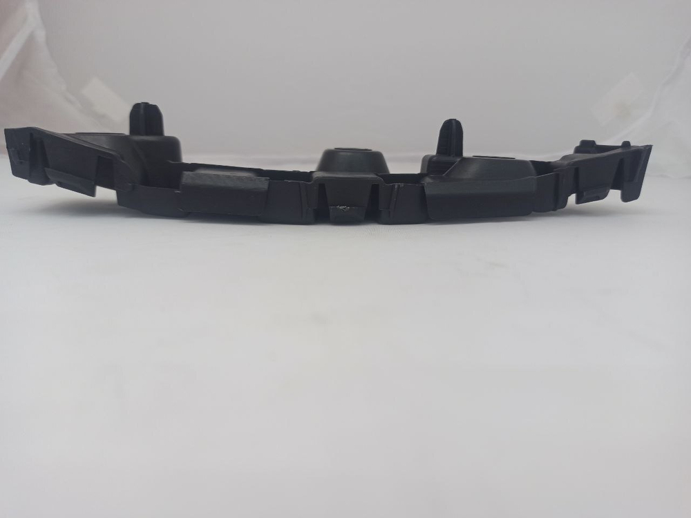 Кронштейн бампера передний левый Tork TRK0584 Renault Logan