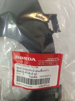 64410-K0A-E10. COVER ASSY., FUEL TANK CENTER. HONDA