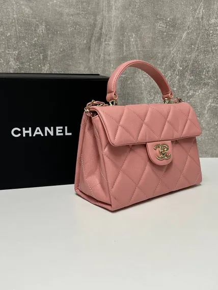Стеганая мини-сумка Chanel с ручкой розовая