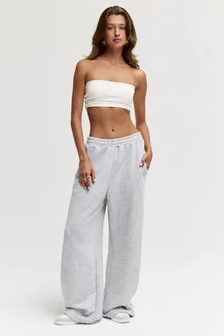 Широкие джоггеры без начеса с лампасом цвета серый меланж