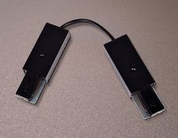 Ambrella Коннектор гибкий однофазный для соединения трековых шинопроводов Track System GL7088