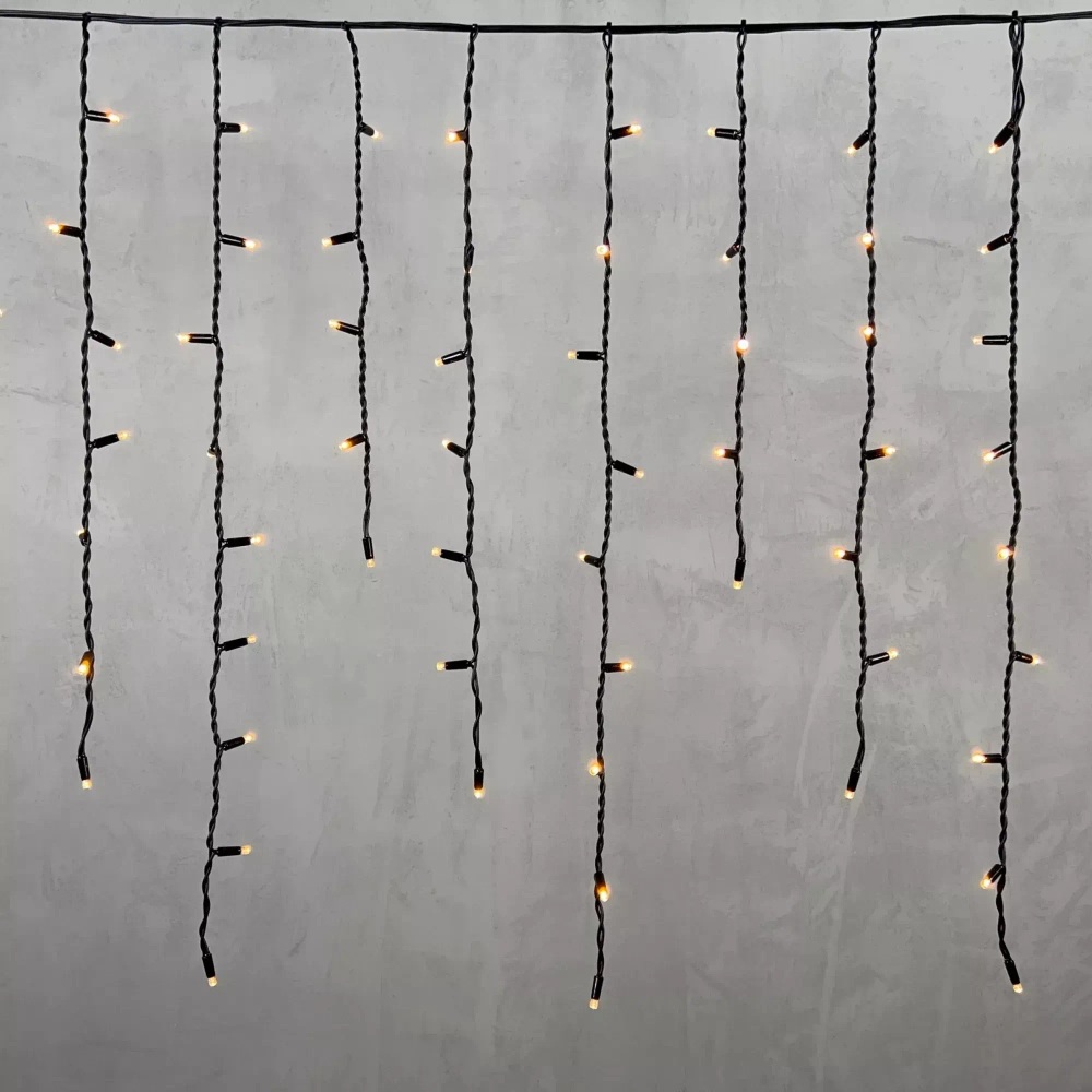 Светодиодная бахрома с колпачком 3,2*0,9 м., 168 экстра теплых белых LED ламп, каучуковый черный провод, LTC (LL168-1-2EWW)