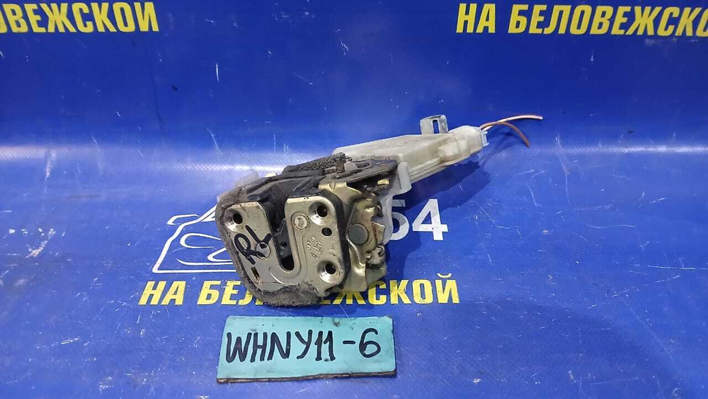 Замок двери задней левой NISSAN WINGROAD 1999