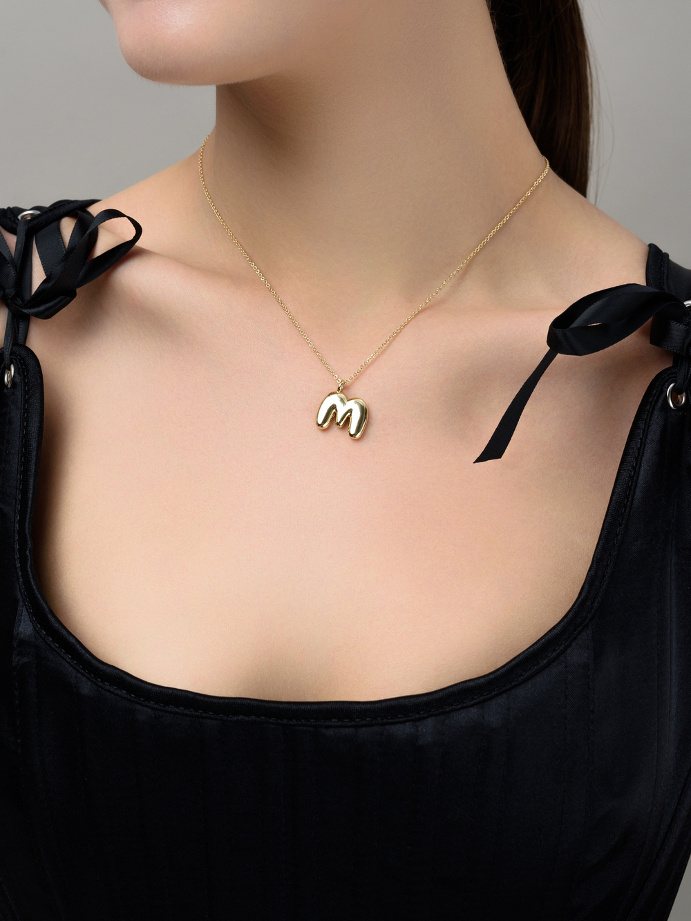 Колье с буквой М