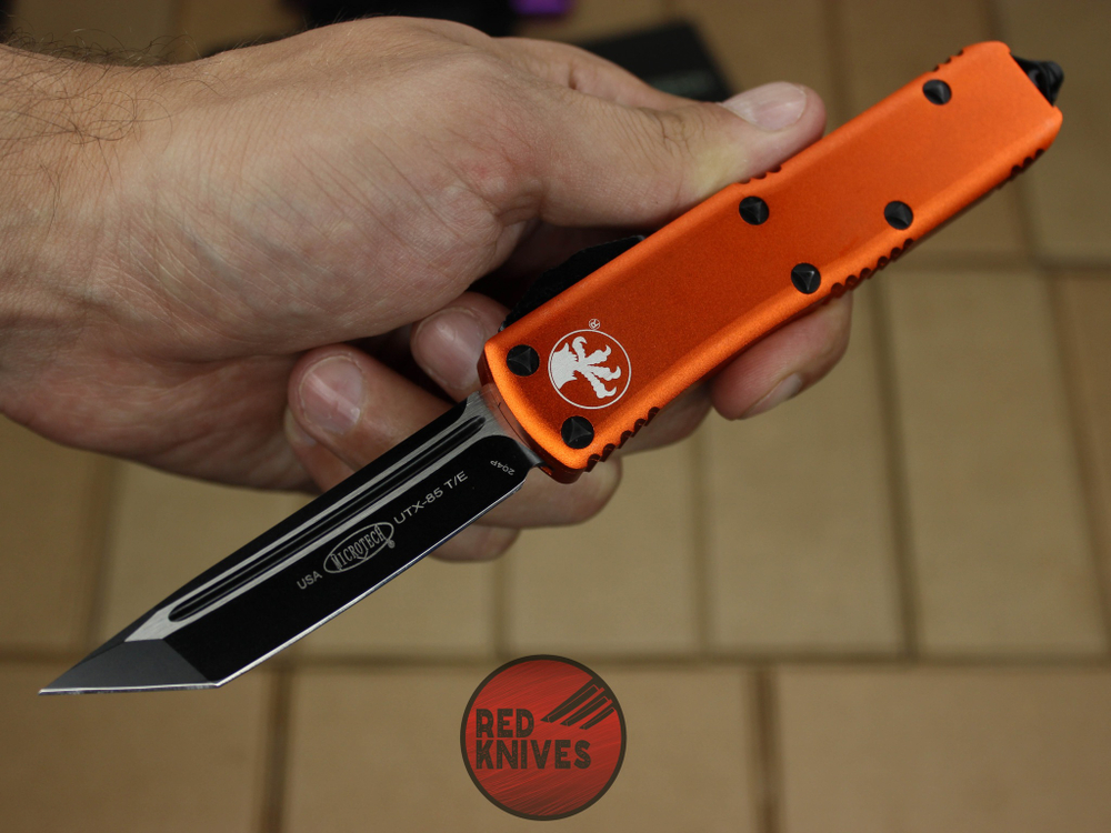 Нож Microtech UTX-85 T/E - оранжевая рукоять, танто клинок, черный RK-396