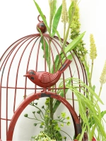 Композиция настенная с цветами в металлической клетке