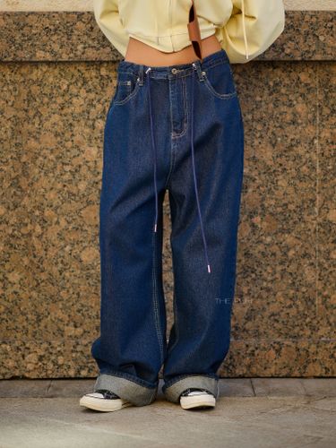 Темно-синие джинсы-трансформеры на кулиске