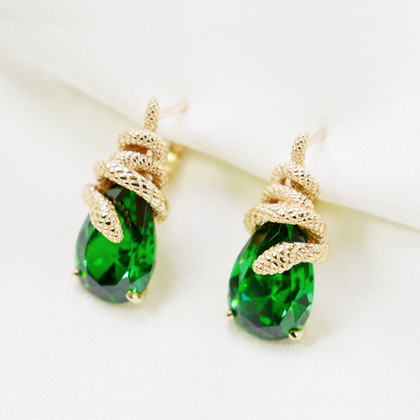 Серьги Serpenti