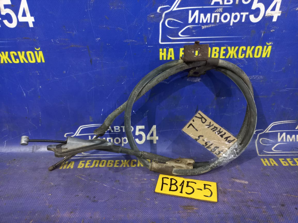 Трос ручника левый NISSAN SUNNY 1999