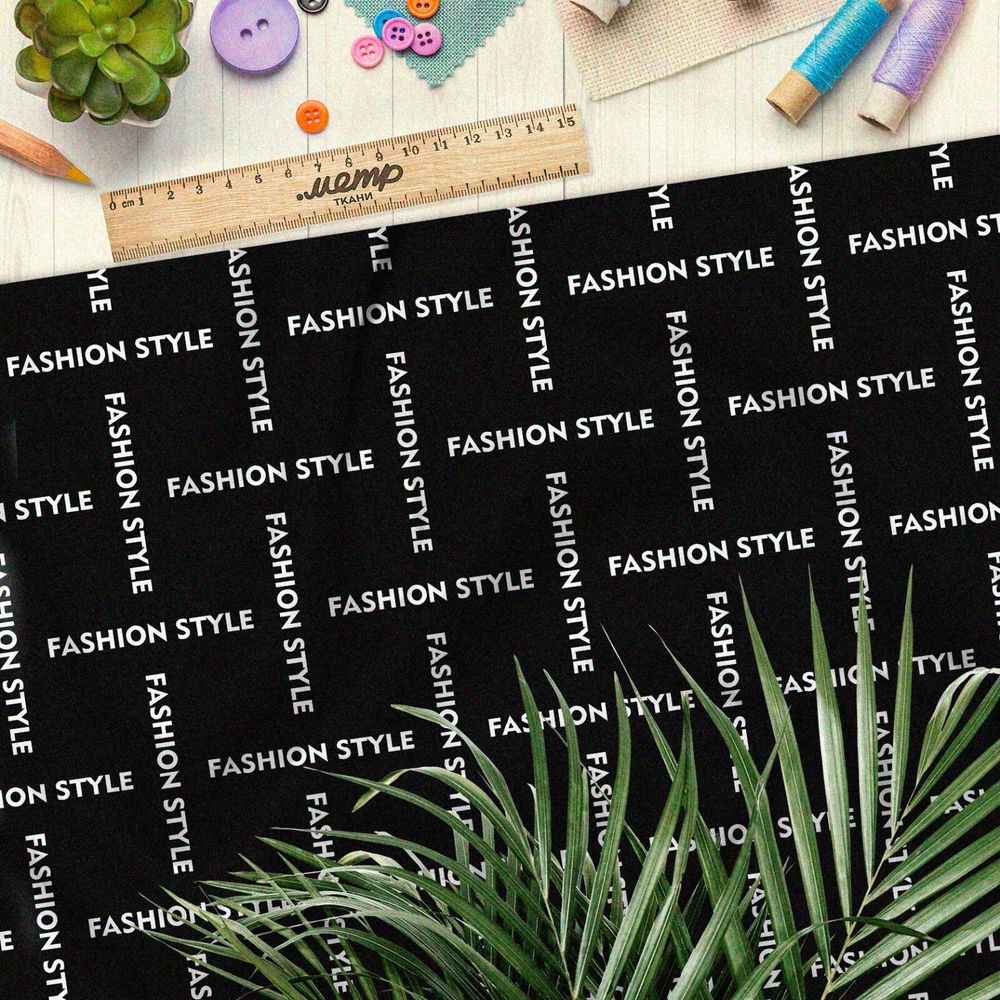 Ткань бифлекс стильная клетка из белых надписей на чёрном фоне