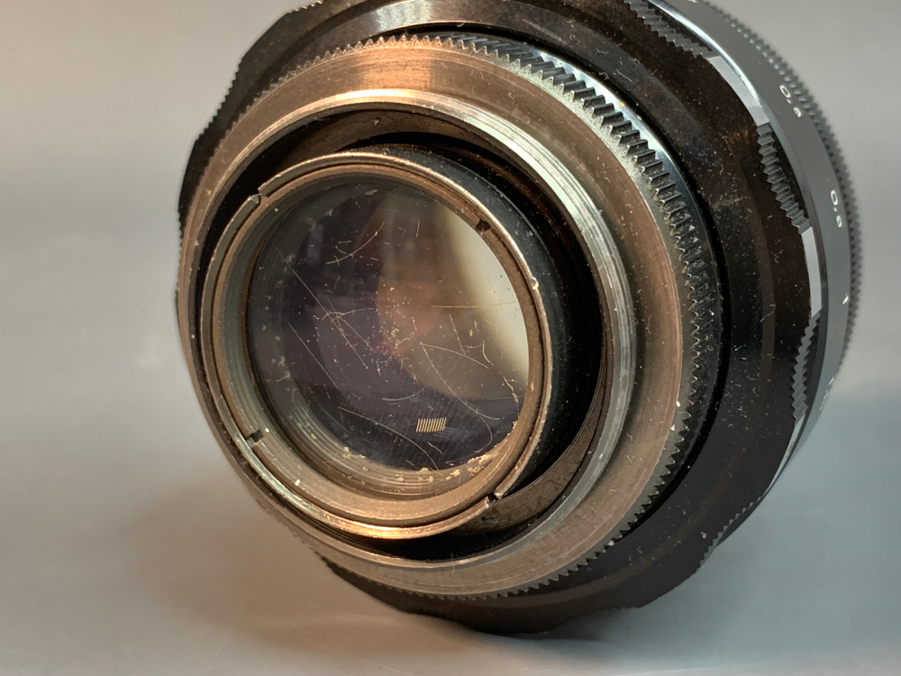 Helios-44, грязь внутри задней линзы