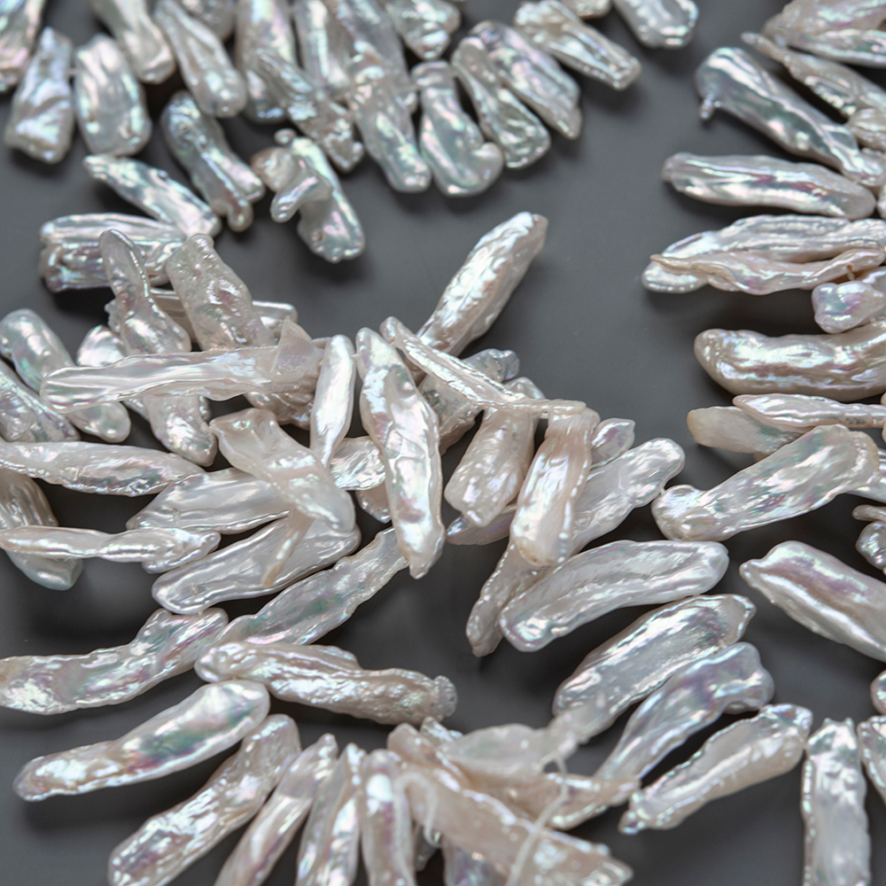 Жемчуг культивированный Бива, белый, со смещенным боковым отверстием 14-38мм