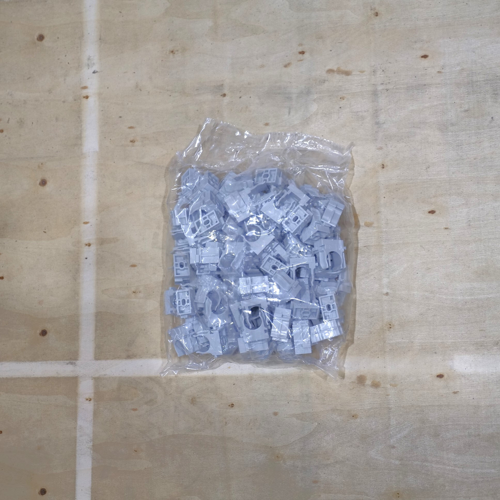 Крепеж-клипса для труб для монтажного пистолета серая в п/э д16 (100шт/1100шт уп/кор) Промрукав