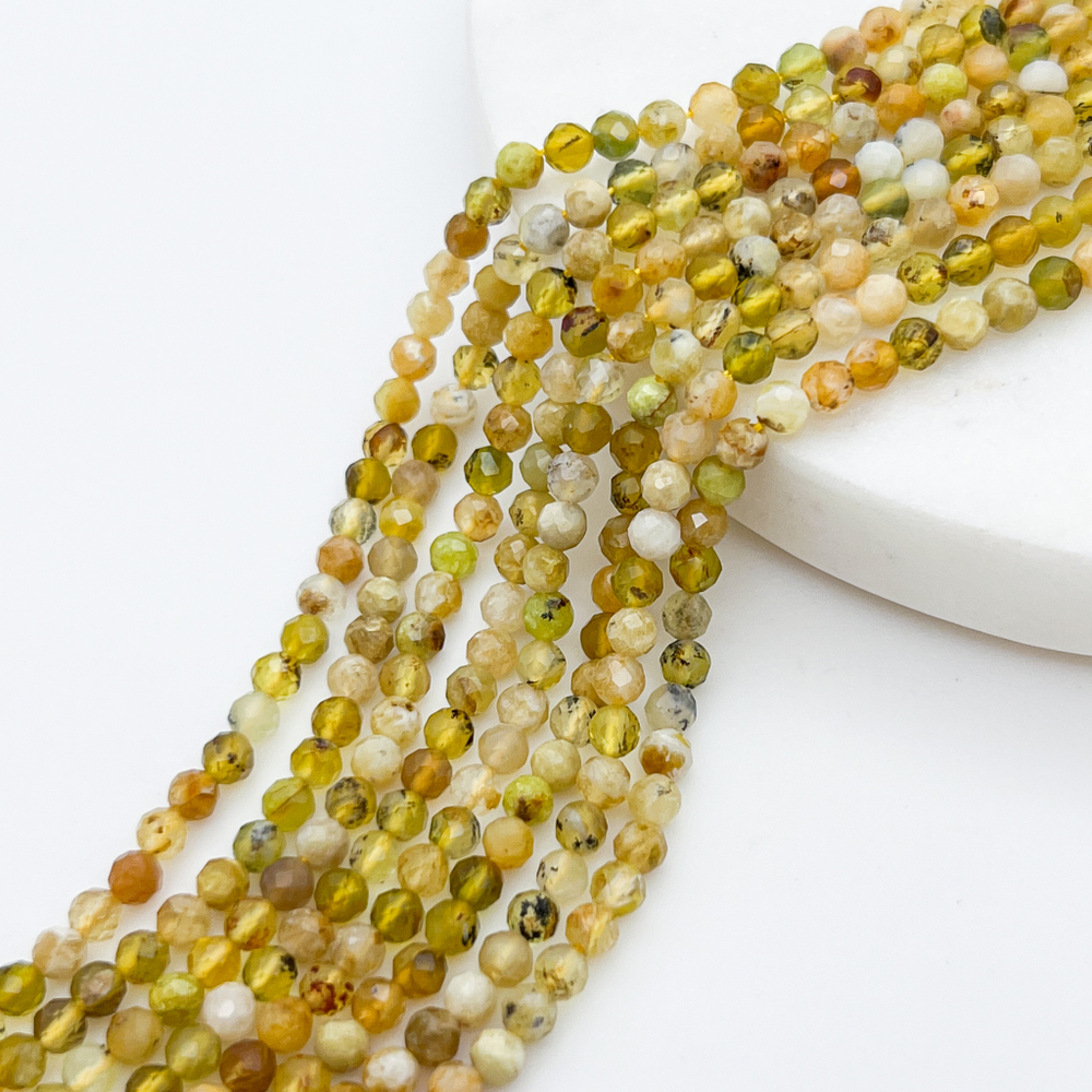 Опал желтый граненый, диаметр около 3,2-3,3 мм, цена за нить 120 шт (38 см)