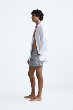 ZARA ПЛАВКИ ИЗ ЖАТОЙ ТКАНИ В МЕЛКУЮ ПОЛОСКУ, СЕРО-СИНИЙ