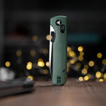 Складной туристический нож TRIVISA Sabretooth-GM клинок 14C28N рукоять микарта (черный-зеленый)