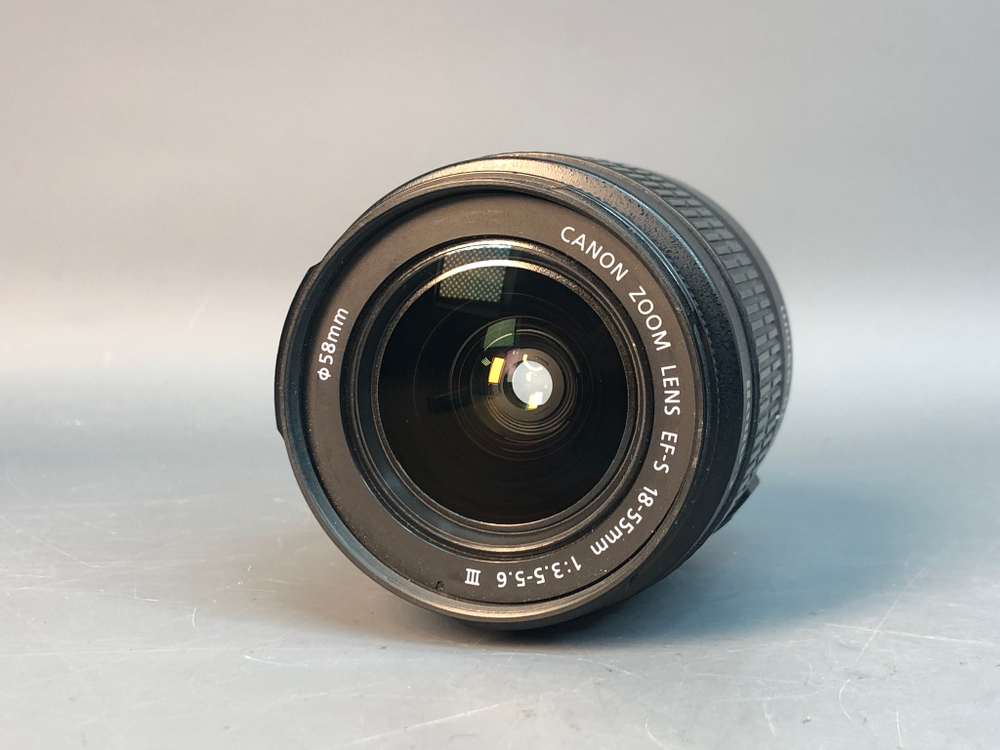 Canon 1100D + Kit 18-55mm, 26013 кадров пробега.
