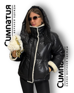 Зимняя куртка в черном цвете с декоративными деталями из эко меха