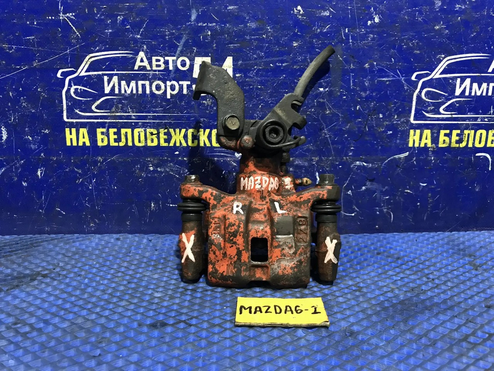 Суппорт тормозной задний левый MAZDA MAZDA6 2003