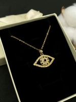 Золотистое короткое колье на тонкой цепочке с кулоном Глаз